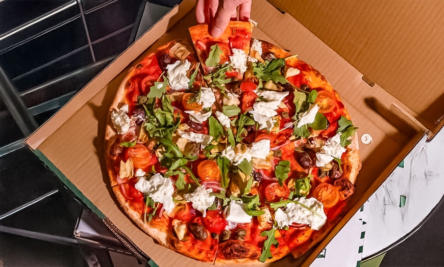 Image 3: Up to 56% Off on Pizza Place at CAPO PIZZA