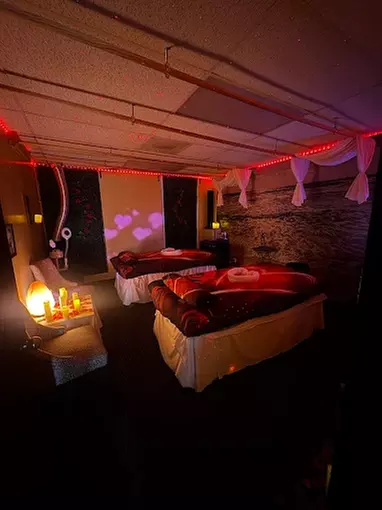 Unwind with a Couples Thai Massage with Hot Stones and Hot Towels