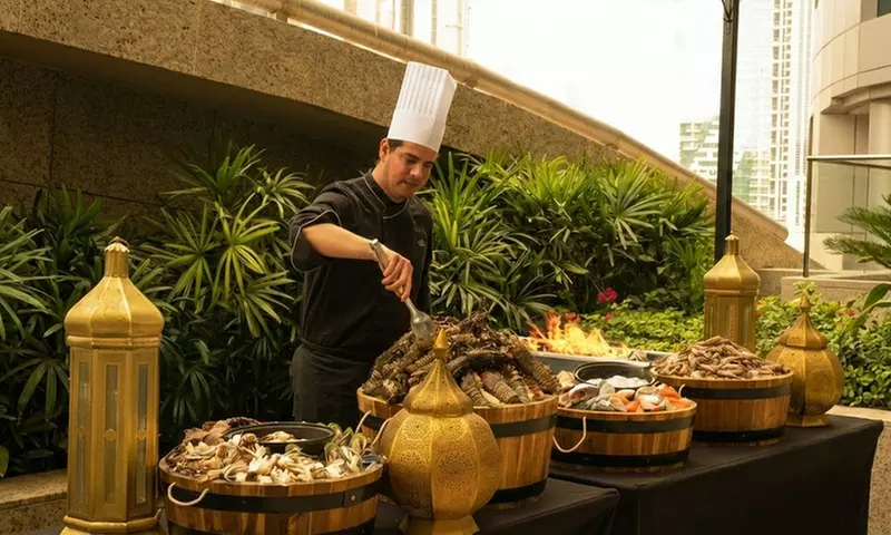 Refined Ramadan Iftar Buffet w/ Drinks -Live BBQ & Corniche Views for Child & Adults @Grills Chill(Up to 26%Off) - Primary Image