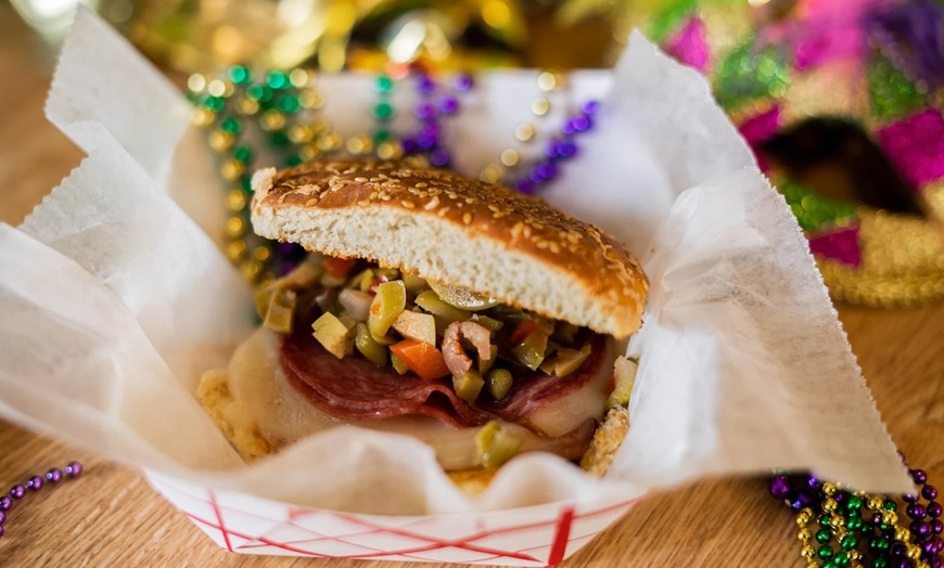 Image 9: Two Po'Boys, Meals for Two or Four With Beignets, and $50–$75 Credits