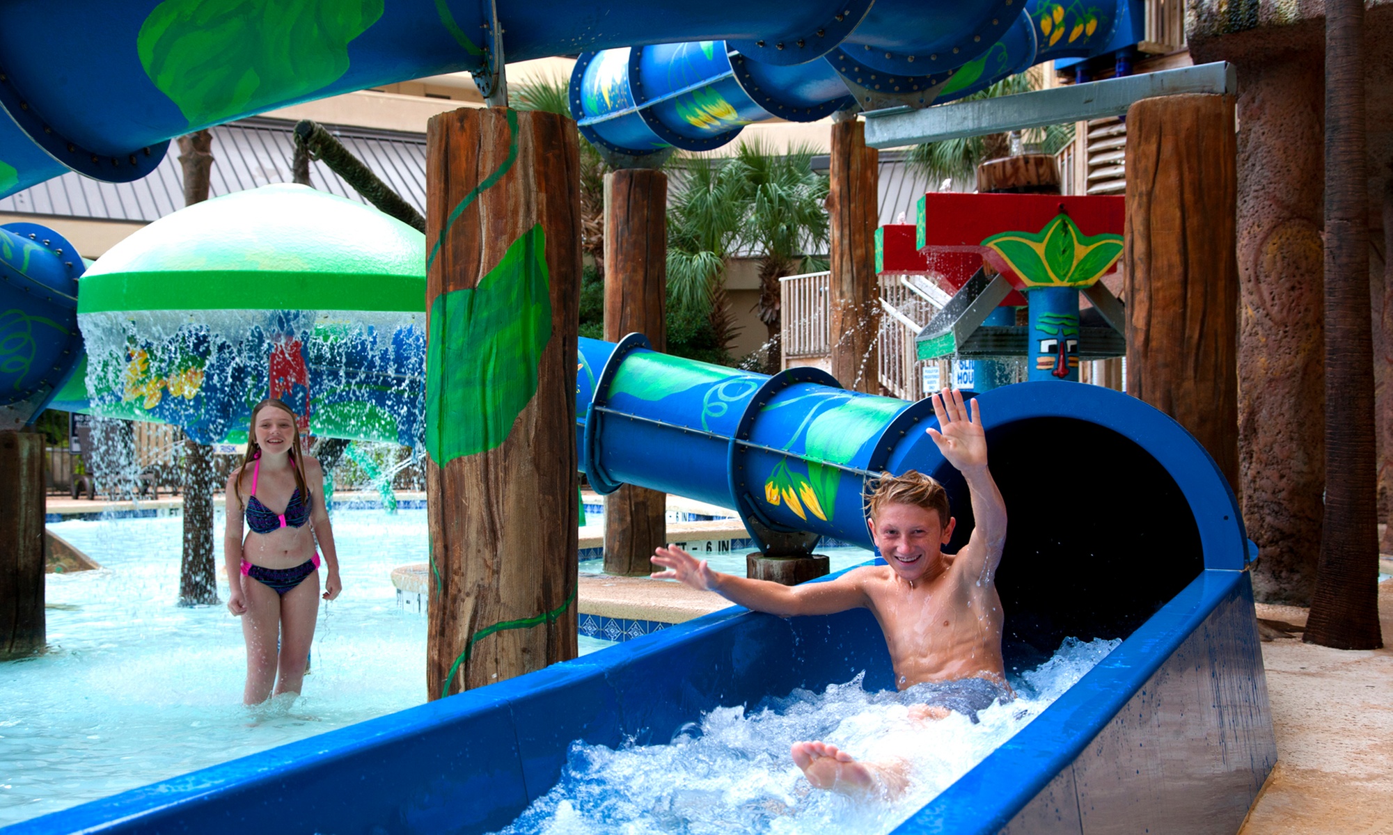 Family fun awaits at Ocean Reef Resort—pools, slides & ocean views!