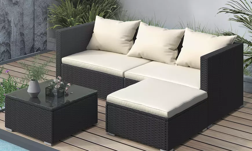 Image 1: Four-Piece Rattan-Effect Garden Sofa Set with Optional Cover