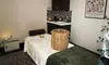 One 60-Minute or 90-Minute Cupping or Hot Stone Massage at Therapeutic experience - Up to 40% Off