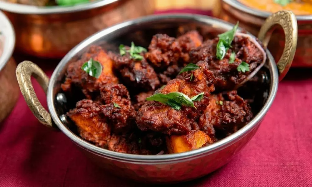 Three Course Indian Meal with Bottle of Wine for Two or Four People