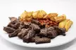 Sabores muy de aquí: menú completo para 2 o 4 personas con parrillada de carne a compartir (hasta 39% menos) - Second Medium