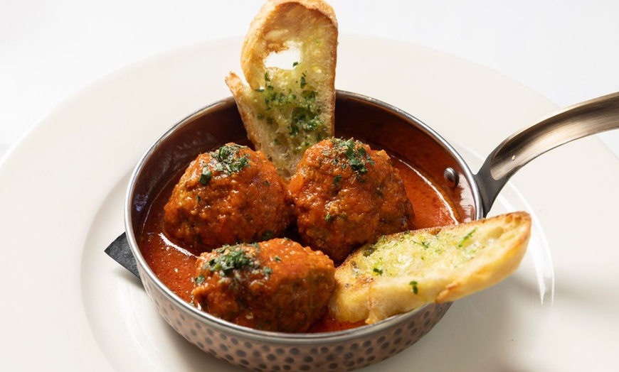 Image 16: Dining Credit or 7-Course Chef's Tasting Dinner for Two or Four
