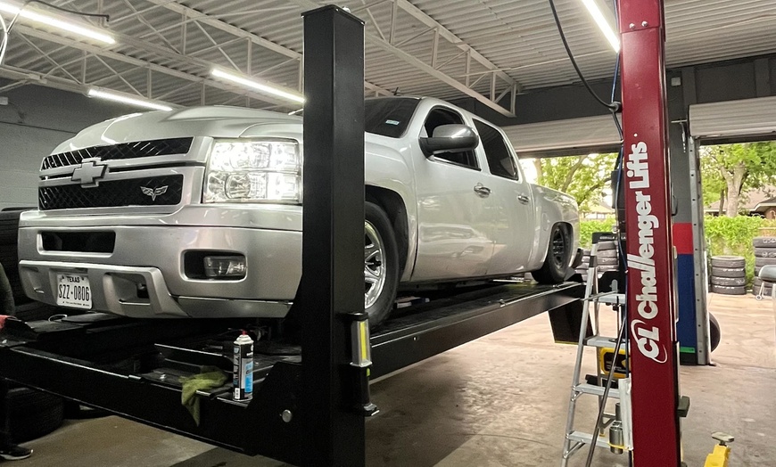 Image 1: 4-Wheel Tire Alignment or Tire Balancing to Boost Safety and Handling