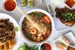 Savor Authentic Flavors: $125, $30, $150 or $50 Gift Card at Pho Hoa Noodle Soup/ Jazen Tea ( Up to 20% Off ) - Second Medium
