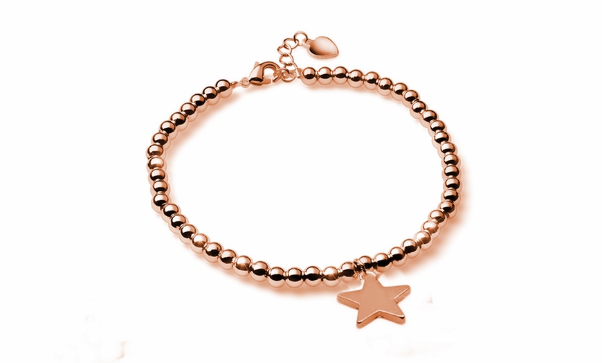 Image 4: Bracciale in acciaio con charm 