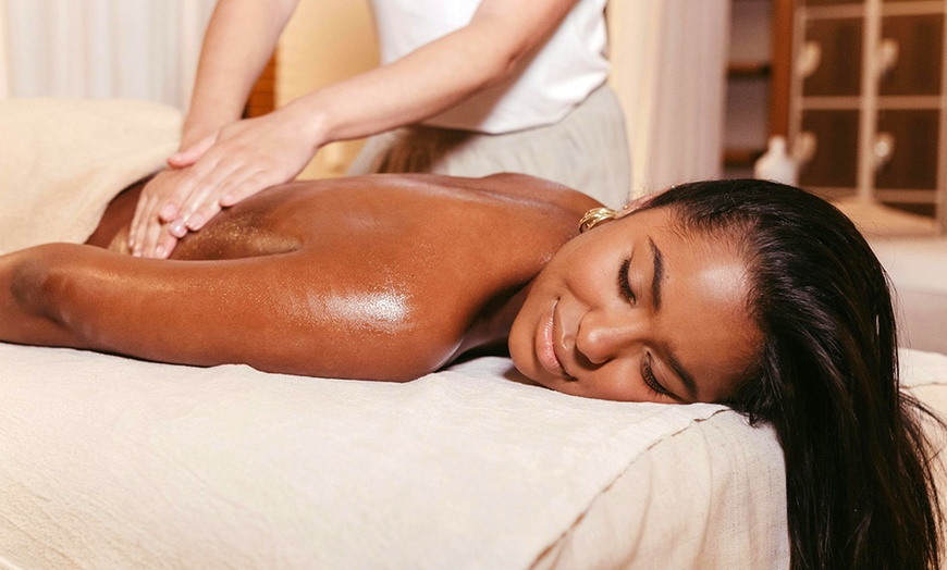 Image 1: Choice of Massage: Deep Tissue, Swedish, Hot Stone and More