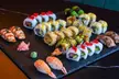 Menú asiático con entrante y 20 piezas de sushi a elegir para 2 y 4 personas con bebida. - Second Medium