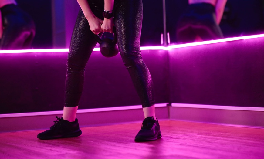 Image 1: Founder's Fee and 3 Classes in San Diego's Nightclub Fitness Studio