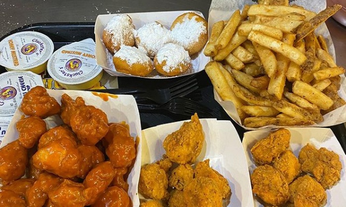 Boneless Chicken Wings, Buffalo Wings, Fries, Sides, and Sodas Combo