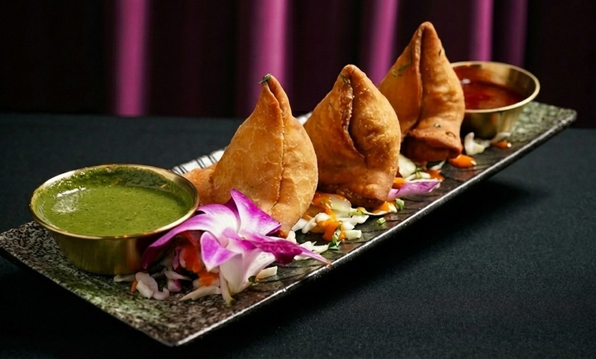 Image 9: Authentic Indian Dining in Winter Park with Entrees, Naan & Drinks