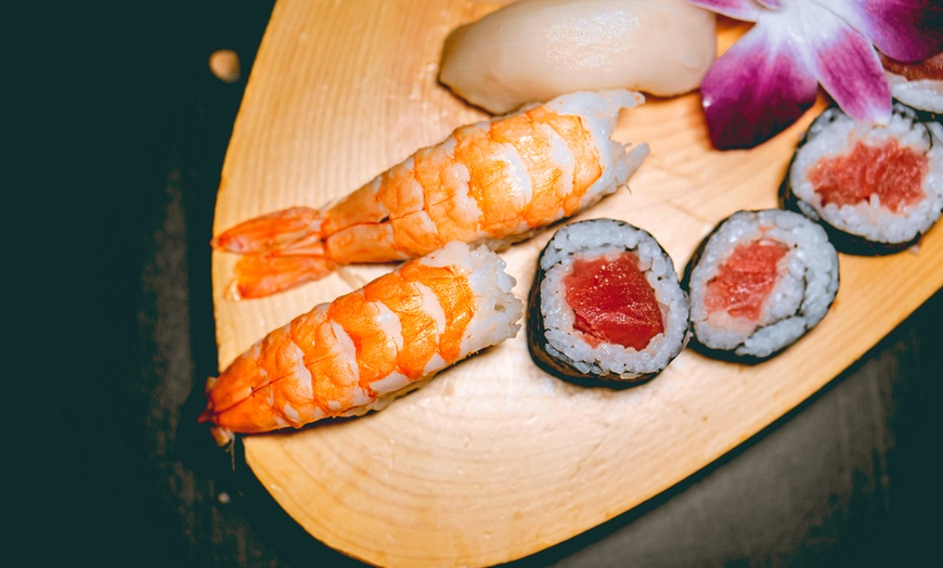 Image 5:  15 or 20% off on the Food Check or $10 OFF any check of $30 or more