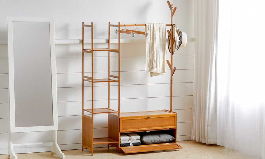 Image 2: Freestanding Bamboo Clothes Rack with Shelves for Storage