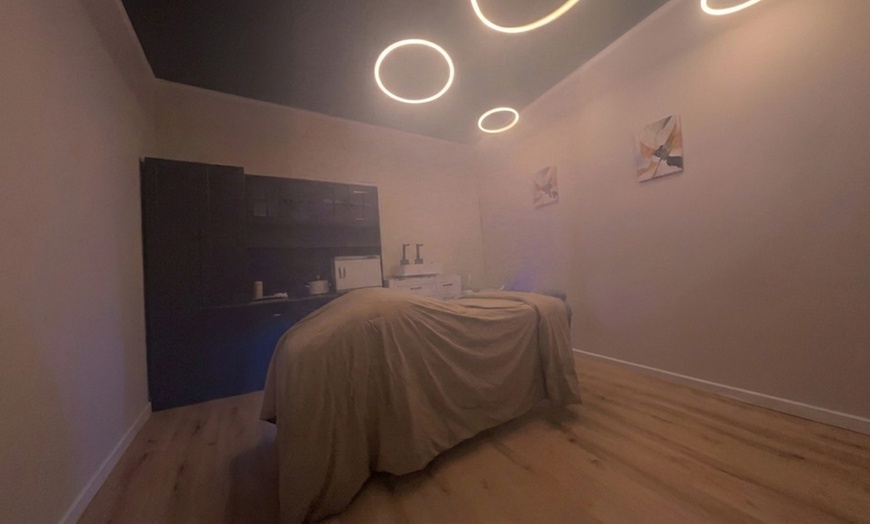 Image 2: One or Two 60- or 90-Min Deep Tissue or Himalayan Salt Stone Massages
