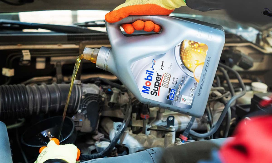 Image 1: Premium American or European Car Service:Oil Change, AC service & More