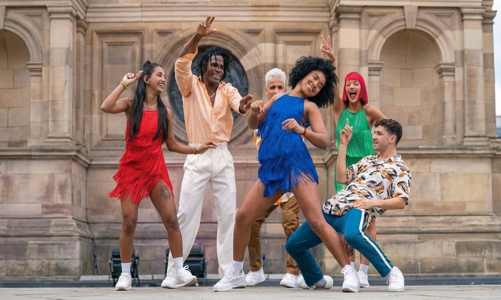 Salsa & Bachata Dance Classes: 2 Adults Intro or Multi-Lesson Pass