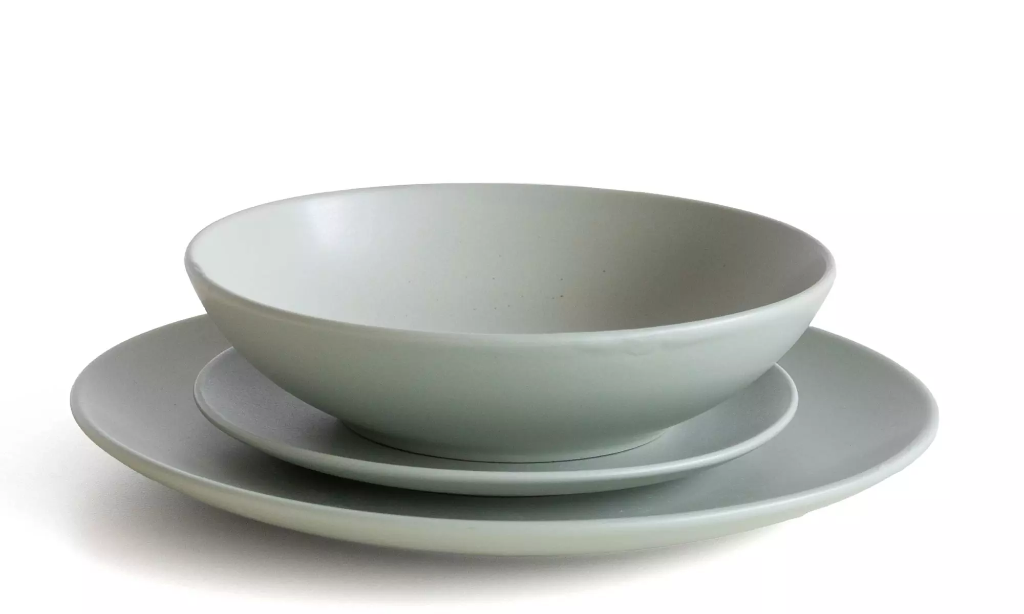 Servizio di 18 piatti in porcellana