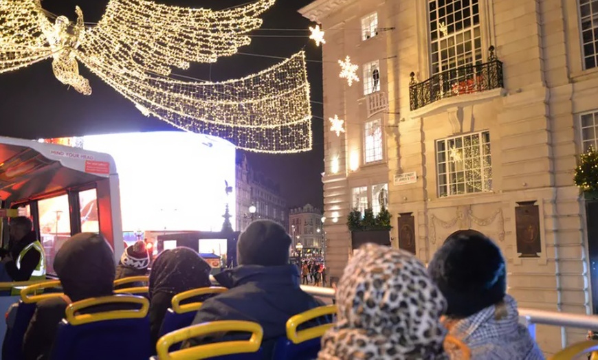 Image 1: Live Guided Christmas Lights Bus Tour for Child or Adult 