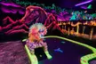 Family Fun Awaits with 12 Holes of Glow in the Dark Mini Golf with 3D Artwork! - Second Medium