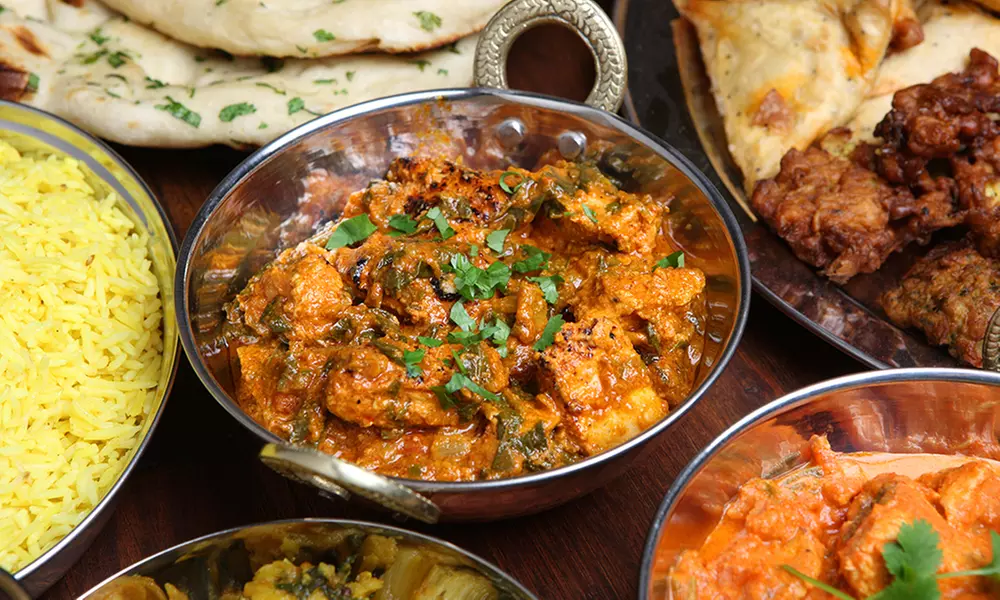 $28 for One Appetizer, Two Entrees, One Naan, and Two Lassi or Soft Drinks at Punjabi Tadka ($51.96 Value) - Primary Image
