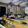 Image 1: Elevate Your Wellness Journey: 5, 10, or 20 Reformer Pilates Classes at Flowing Body Pilates (Up to 63% Off)