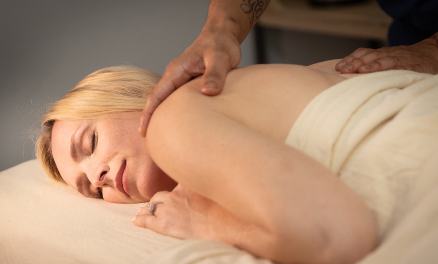 Image 1: 50-Minute Deep Tissue or Aromatherapy Massage w/ Optional Hydrafacial