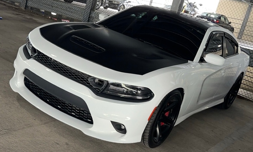 Image 3: Revitalize Your Ride with Quick Wash and Wax Options