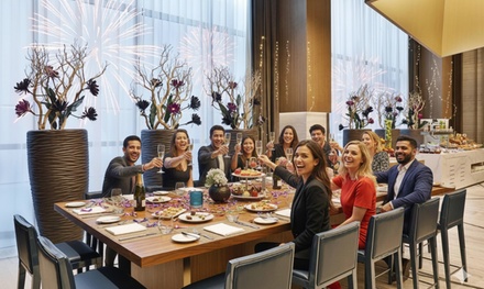 New Year’s Eve Dinner Buffet with Free-flowing Soft drinks For one - About Cosmic Kitchen @ Courtyard Marriott Al Barsha