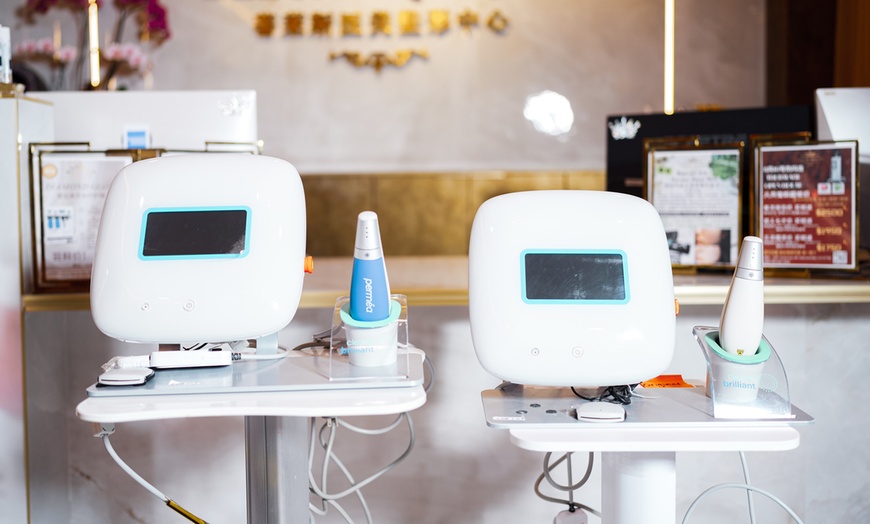 Image 2: One Clear & Brilliant Touch Fraxel Laser for Full Face and Optional Neck at Deluxe Med Spa (Up to 86% Off)