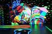 Ein leuchtendes Abenteuer: 3D-Schwarzlicht-Minigolf für 2 bis 8 Personen (bis zu 42% sparen) - Second Medium