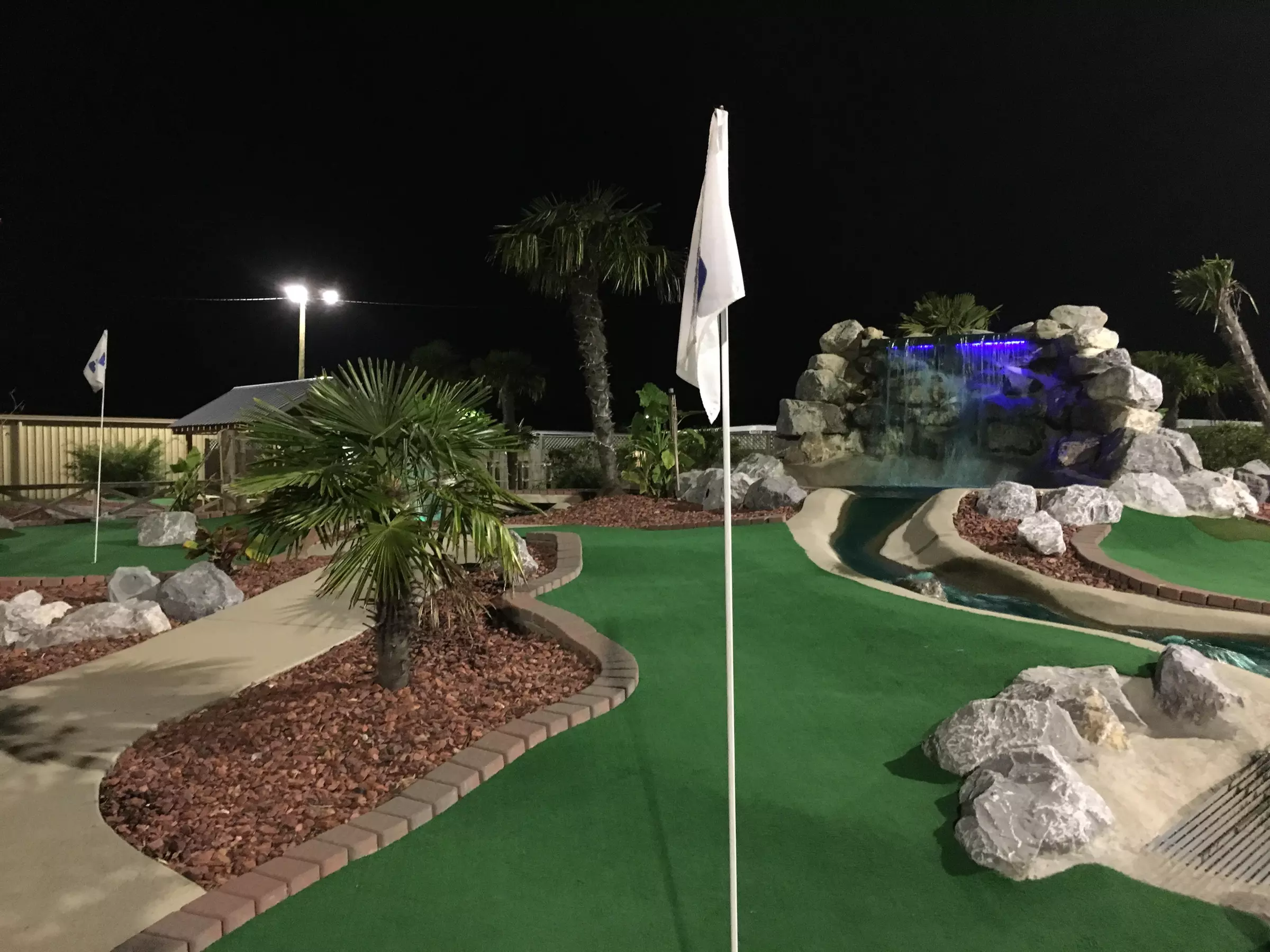 Swing into Fun: 18-Hole Round of Mini Golf with Sodas and Ice Cream