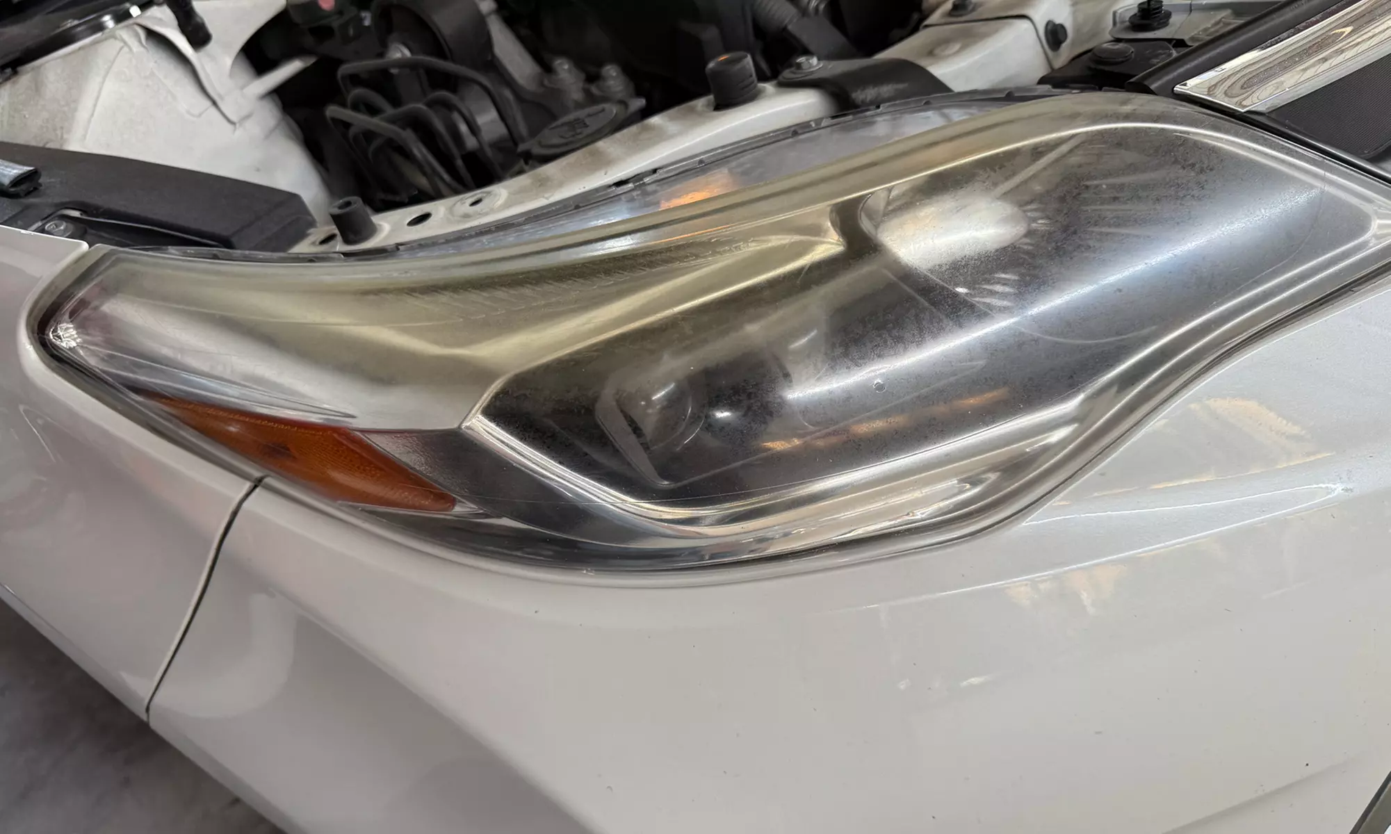 Headlight Polish or Headlight Restoration with Clear Coat at Calcena Body Shop—Up to 40% Off - Second Medium