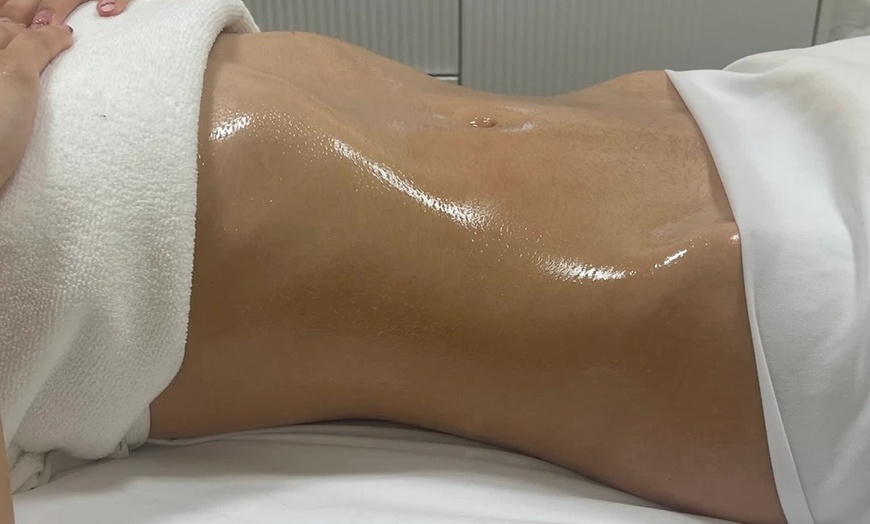 Image 2: 1,3, or 5 60-Min Lymphatic Drainage Massage + Cupping or Hot stones 