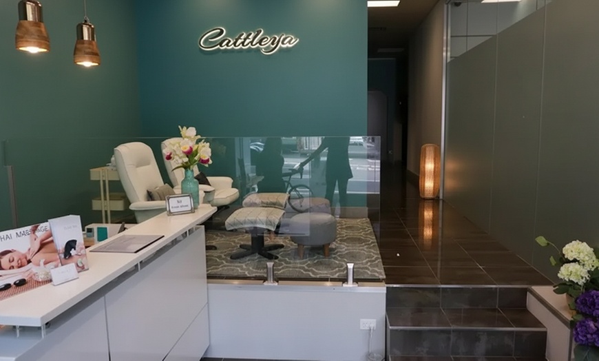 Image 5: Unwind with One 60 or 90 Minute Hot Stone or Coconut Oil Massage 