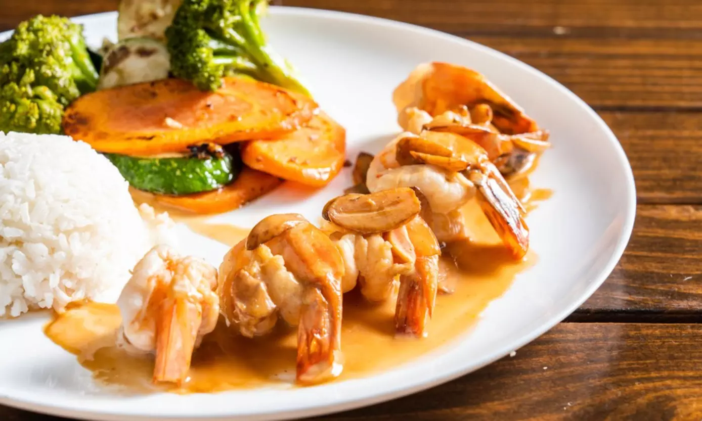 Vibrant Rooftop Dining: Choose Meals, Margaritas, or Dining Credit