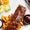 Image 2: Glasierte Babyback Ribs mit Löffelpommes & Saucen für 1 - 4 Person