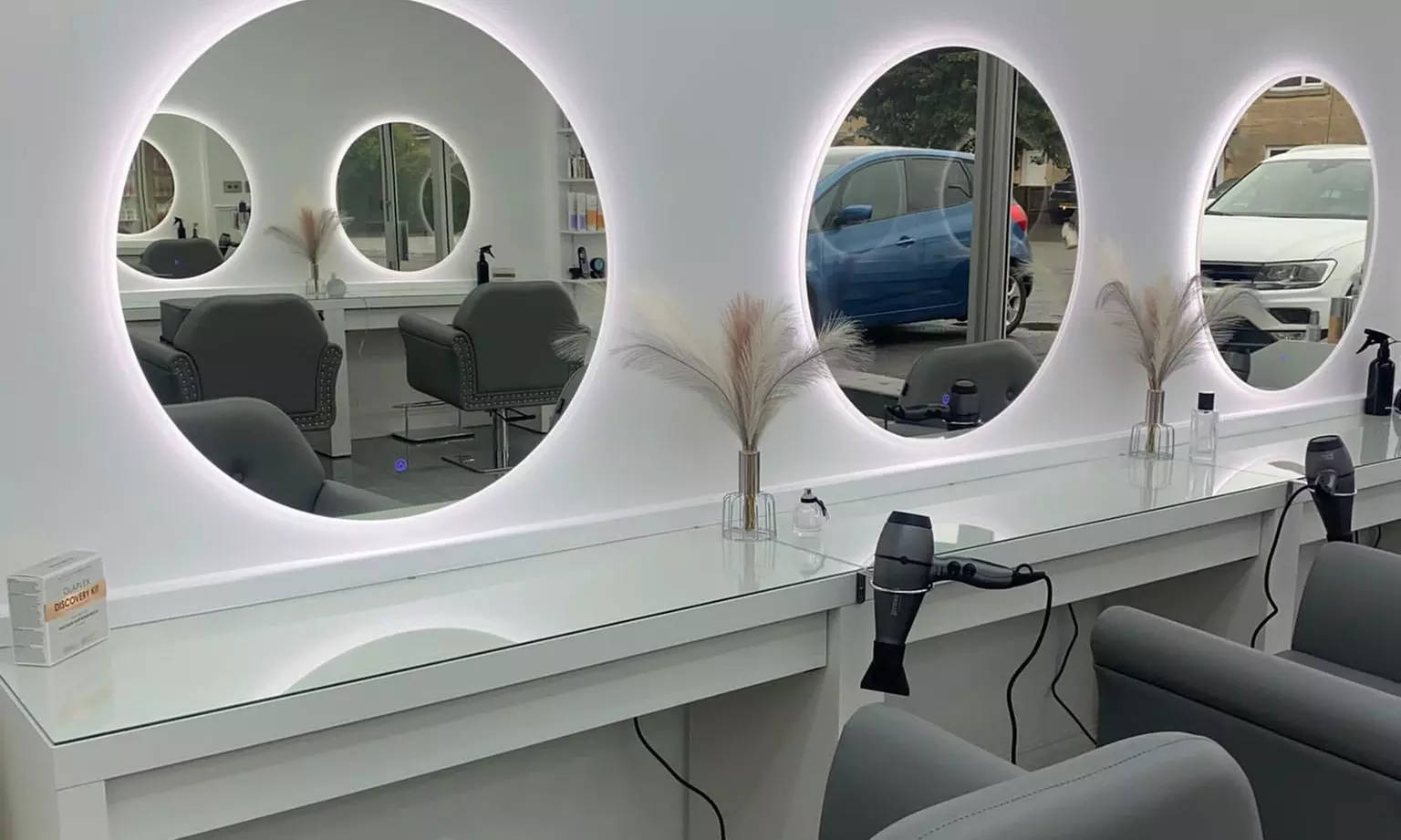 Professional Haircut, Revitalizing Wash, & Expert Blow-Dry