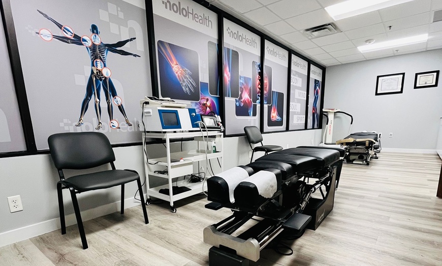 Image 2: Max Chiropractic Center: Advanced Laser Therapy for Pain Relief