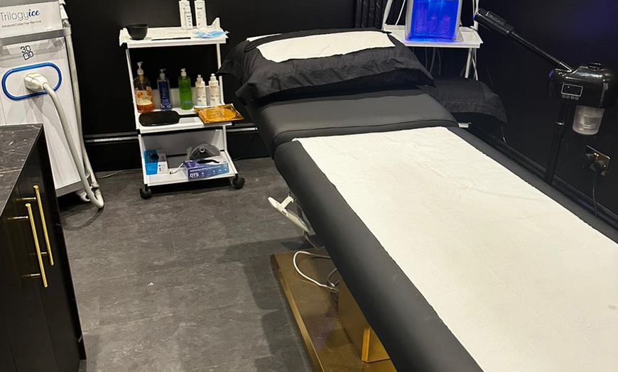 Image 1: 1, 4, 6 or 8 Sessions: Ultrasonic, Vacuum RF & RF for One or Many Area