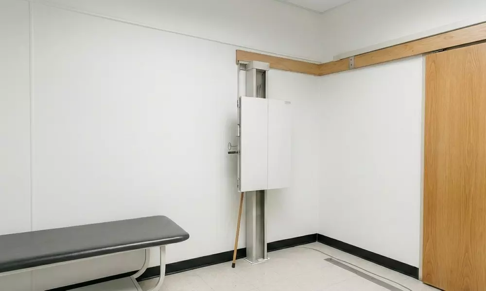 Binns Family Chiropractic's Complete Packages: Consultation, Exam, X-ray, or Traction Therapy (Up to 86% Off) - Second Medium