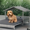 Image 1: Neo Rattan Dog House Outdoor Wicker Dog Bed
