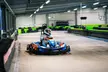 Erlebe Adrenalin pur mit 15 Min. E-Karting Fahrspaß inkl. Helm & Sturmhaube für 1 Person (bis zu 33% sparen) - Second Medium