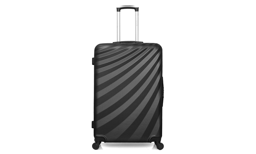 Image 25: Valise en coque rigide de la marque Wave Paris et Hero