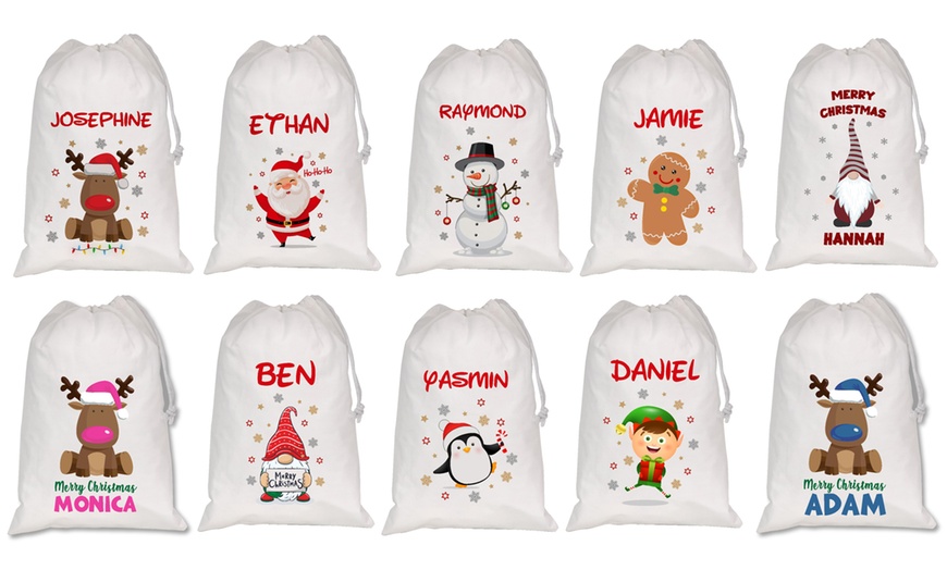 Image 2: Add Christmas Cheer with Personalized White Santa Sacks