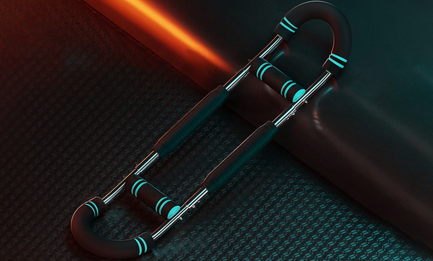 Image 2: Twister Arm Exerciser Adjustable Spring Workout Bar