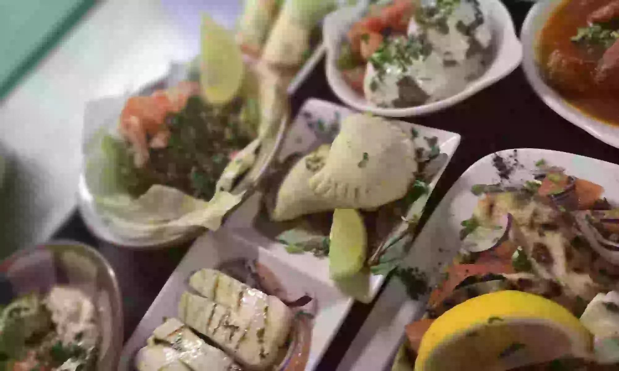 Choose any Main Course & Glass of Wine or Any Mezza For Up to Four