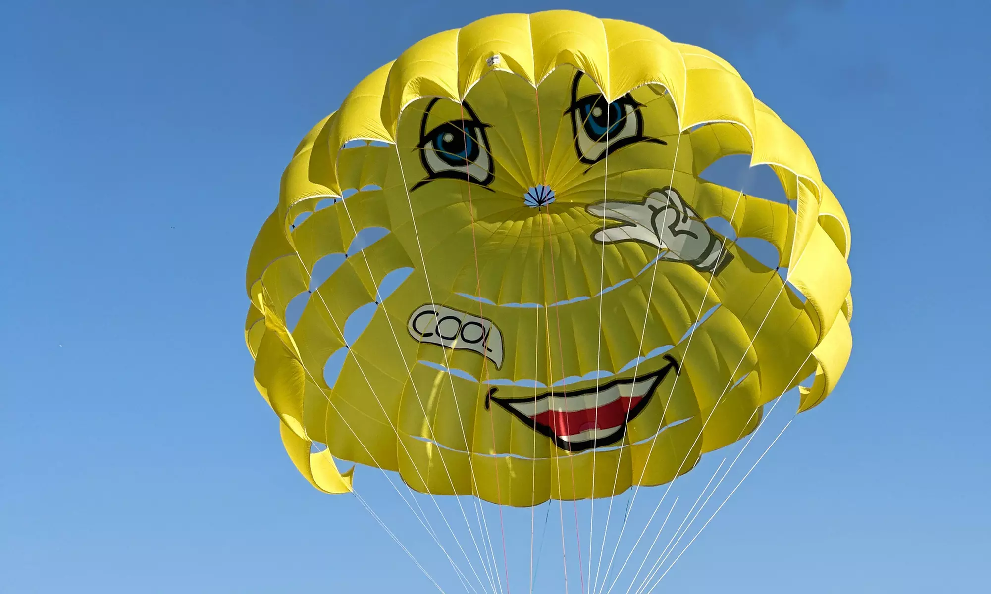 Soar Above Dubai's Coastline with 30-Minute Parasailing for One or Two